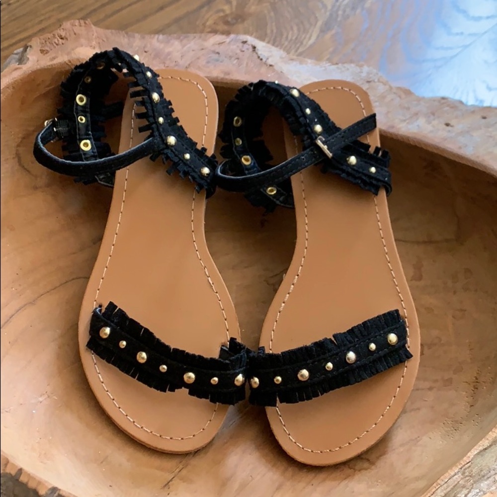 Almost brand new PEEK black and gold sandals